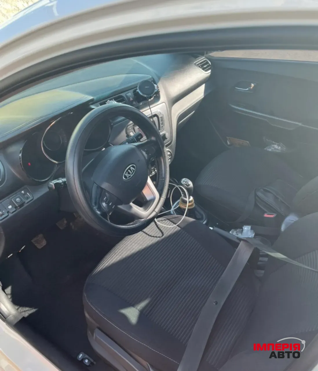 Kia Rio - фото 8