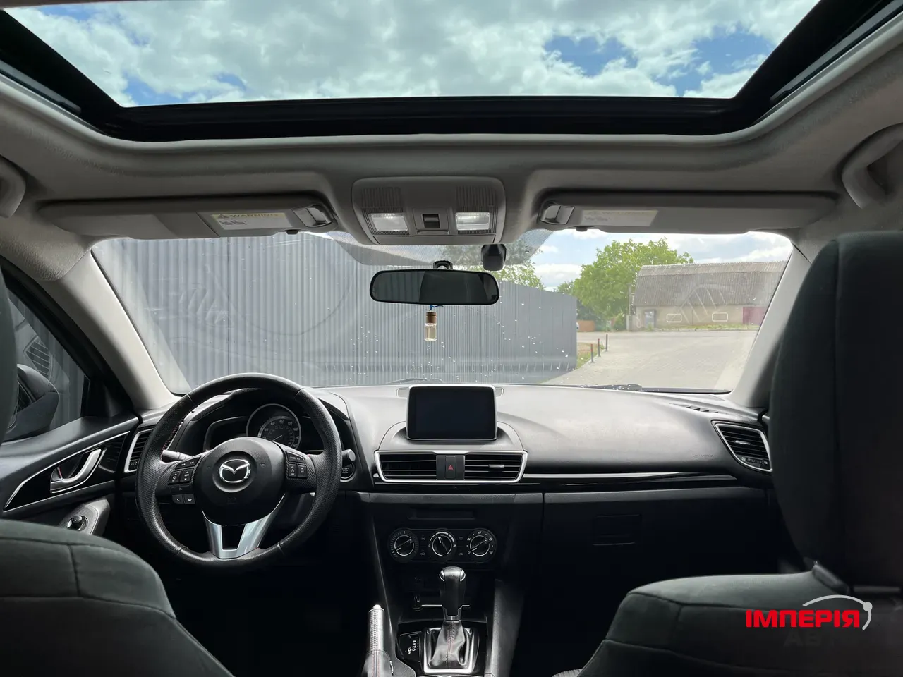 Mazda 3 - фото 11