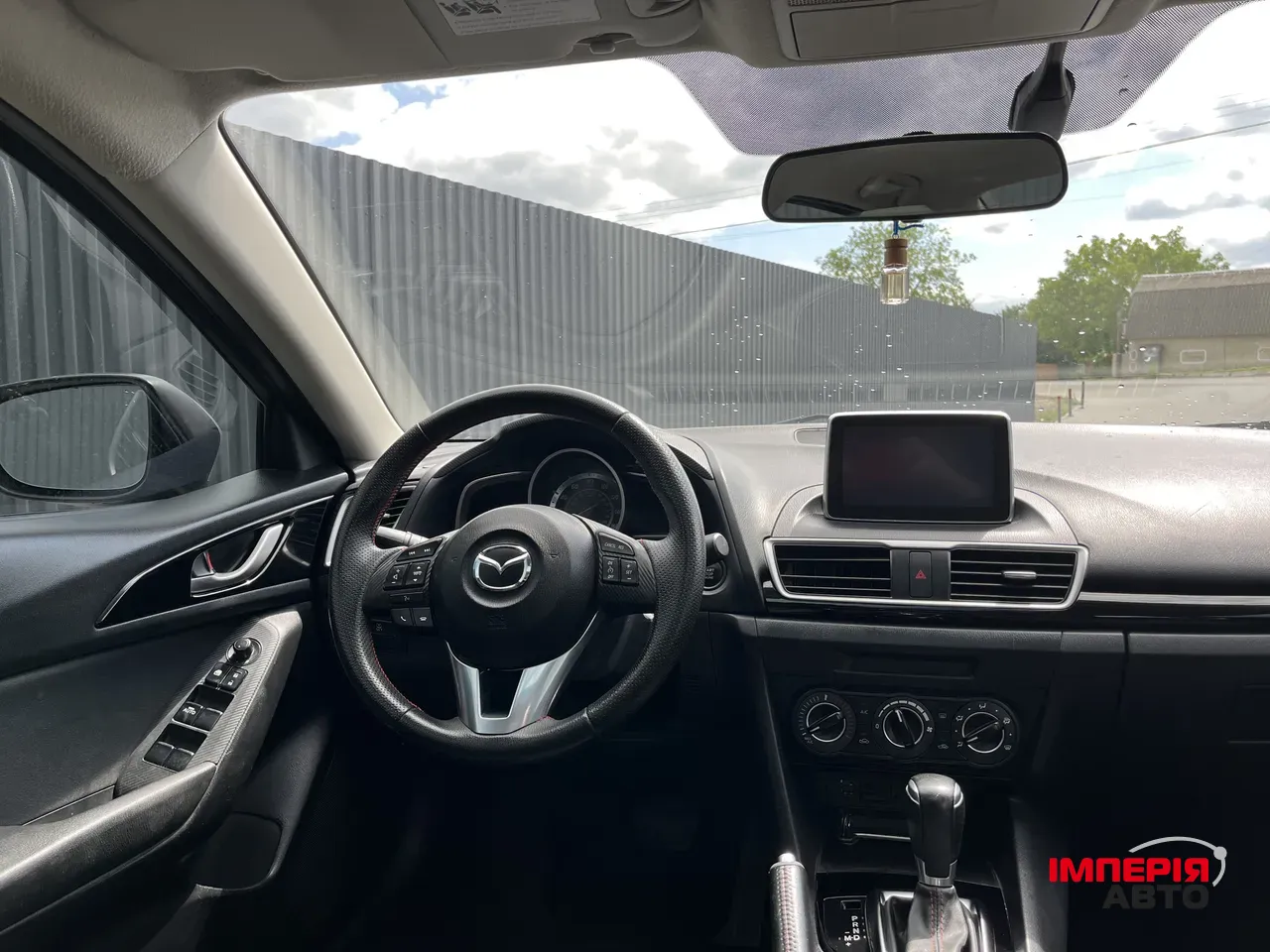 Mazda 3 - фото 13