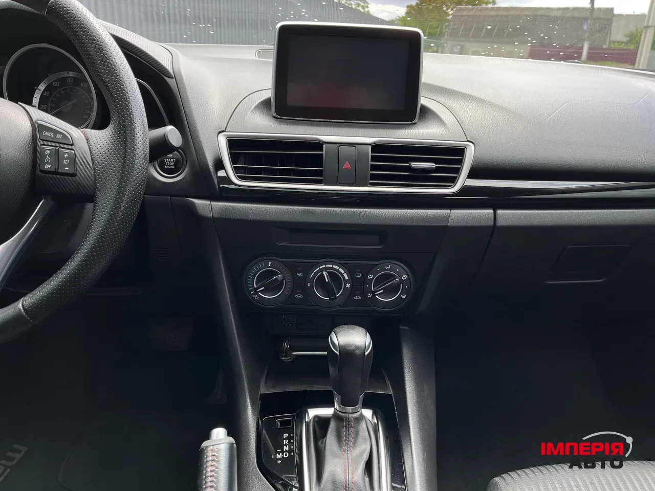 Mazda 3 - фото 12