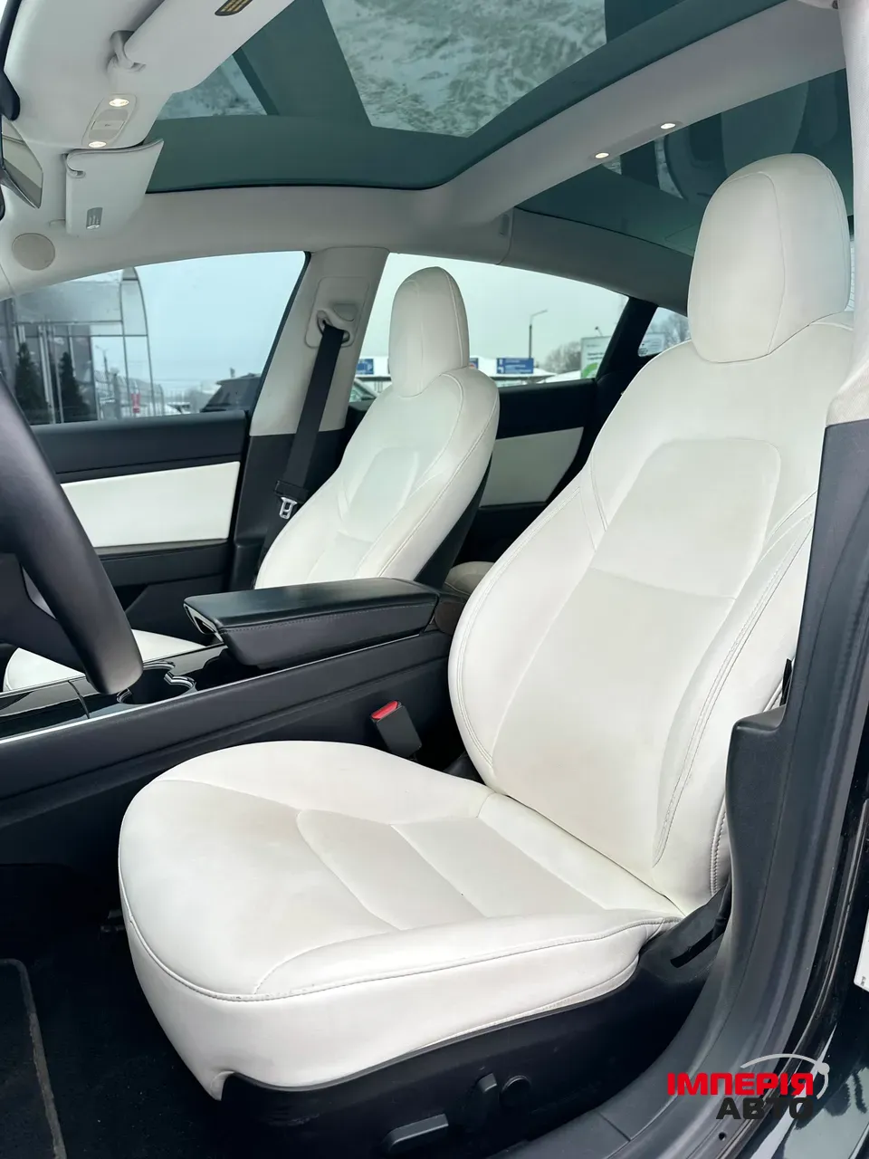 Tesla Model 3 - фото 10