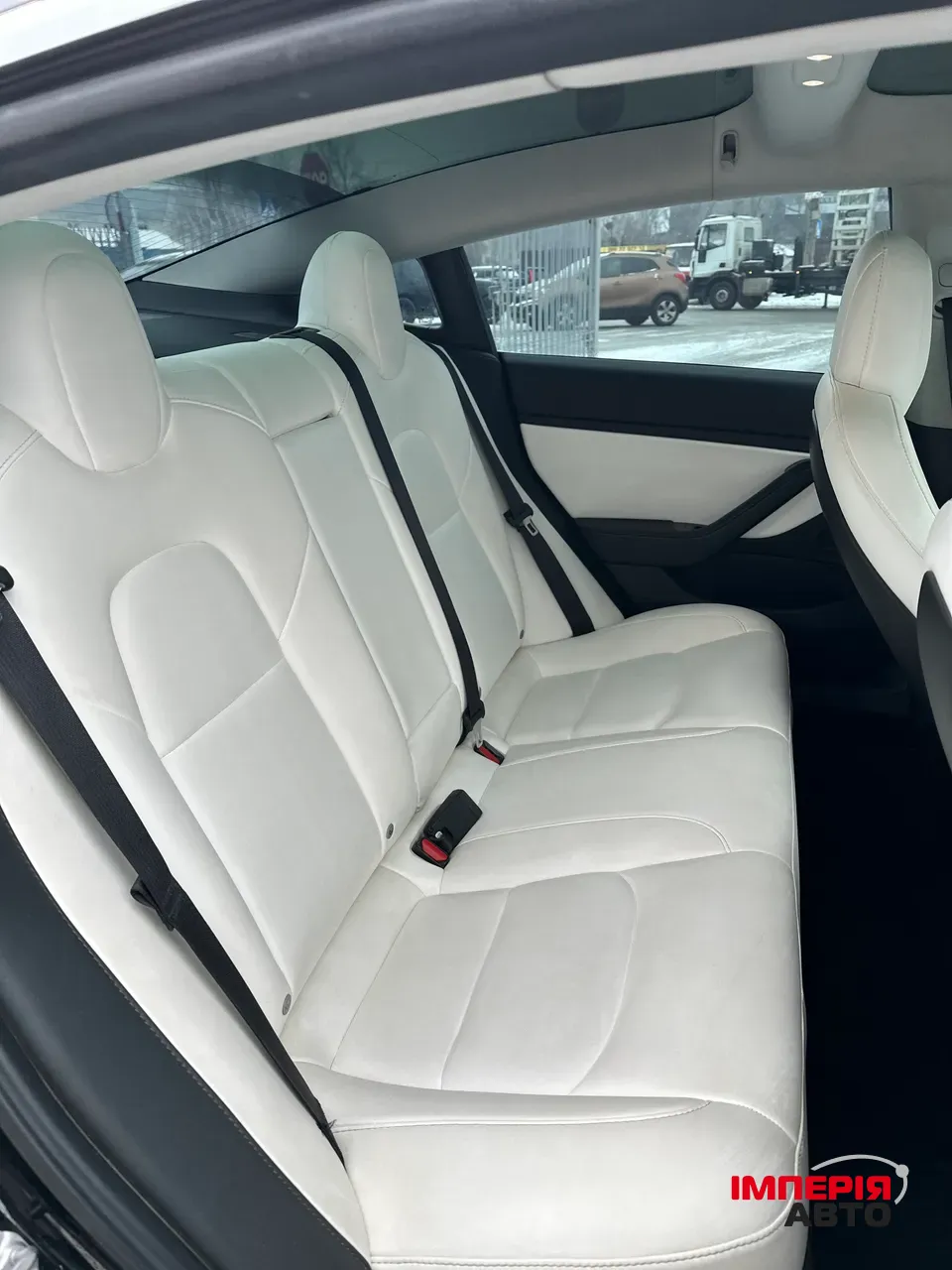 Tesla Model 3 - фото 13