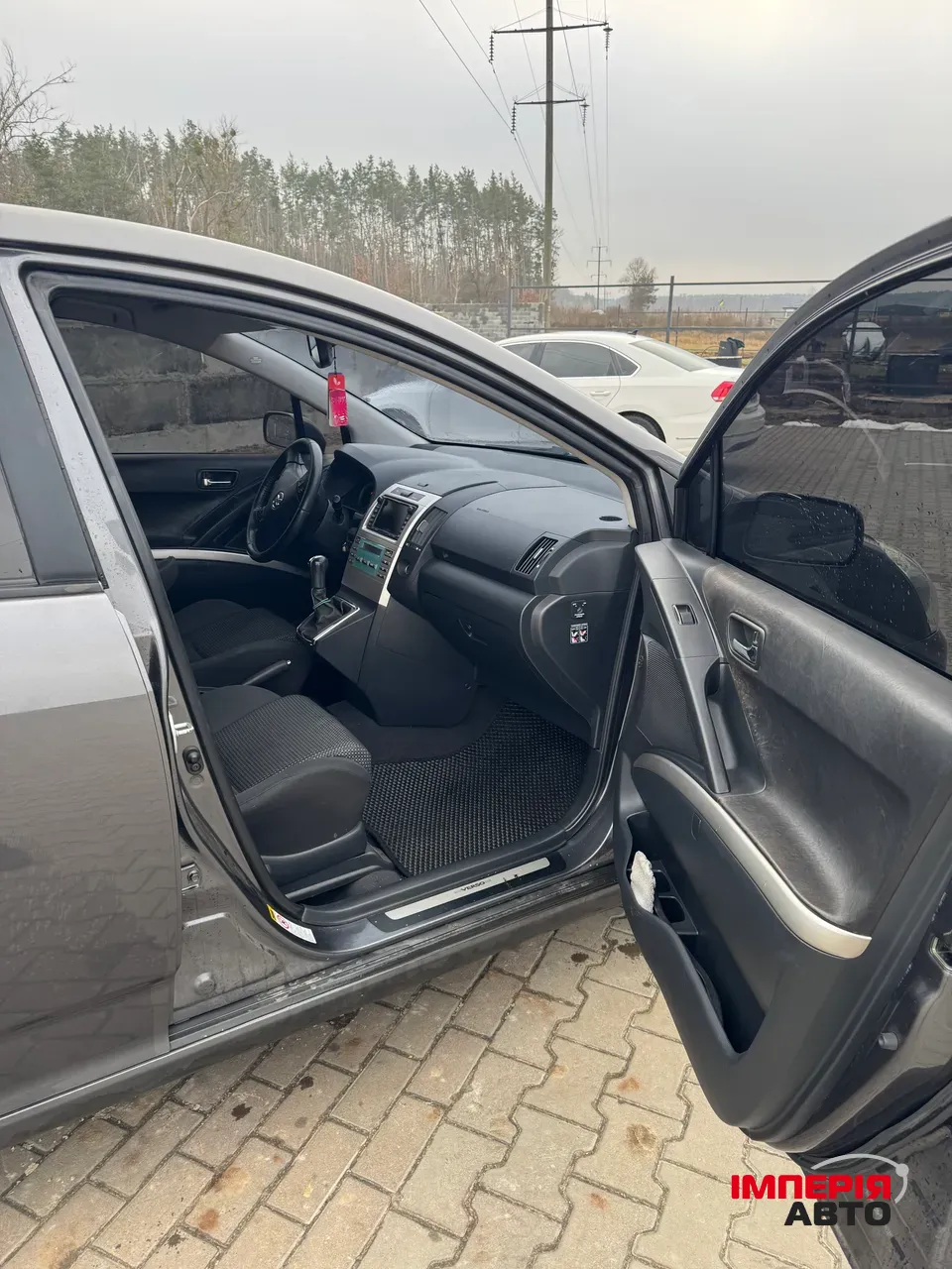 Toyota Corolla Verso - фото 11