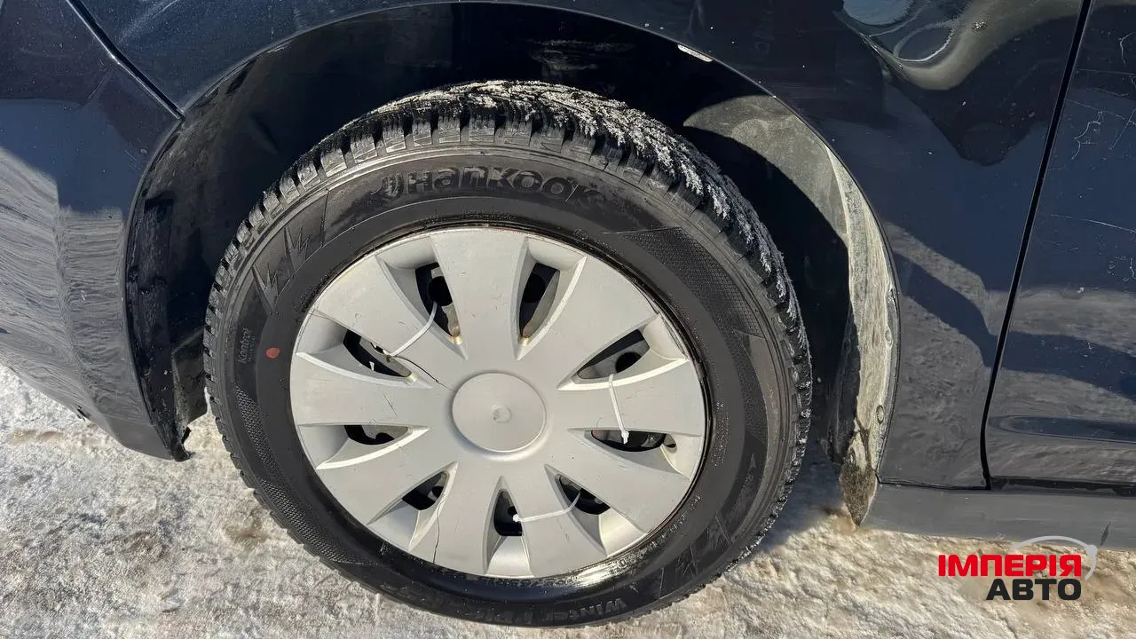 Nissan Tiida - фото 10