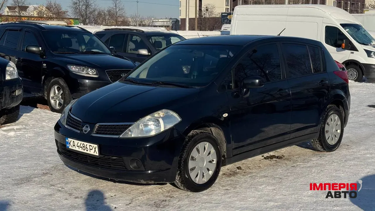 Nissan Tiida - фото 27