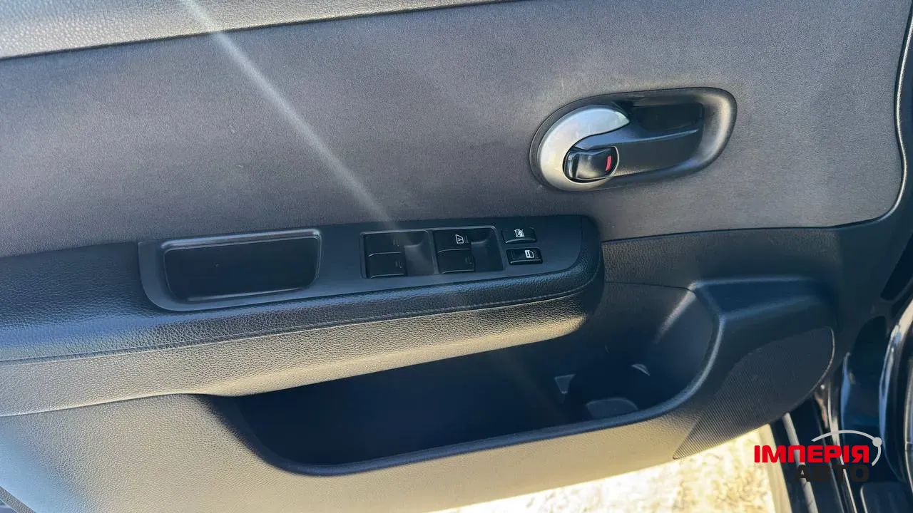 Nissan Tiida - фото 11