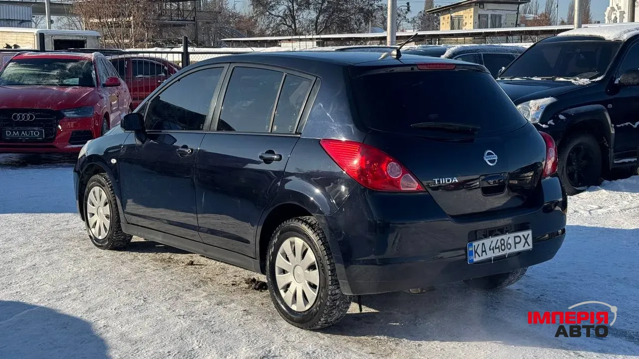 Nissan Tiida - фото 6
