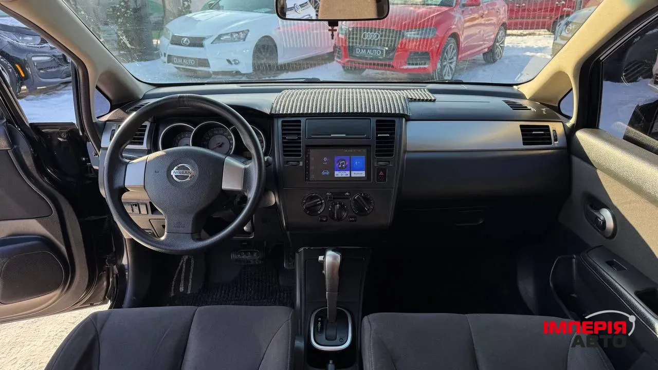 Nissan Tiida - фото 8