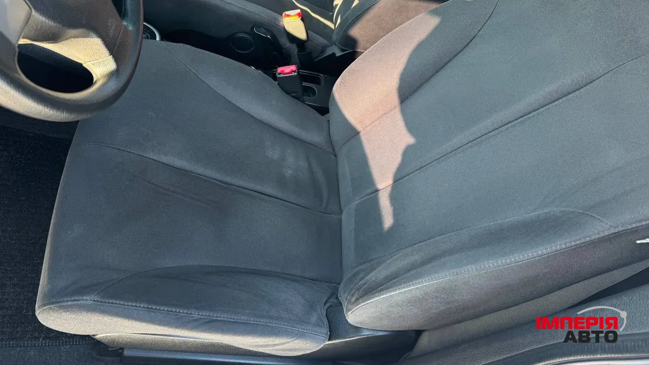 Nissan Tiida - фото 13