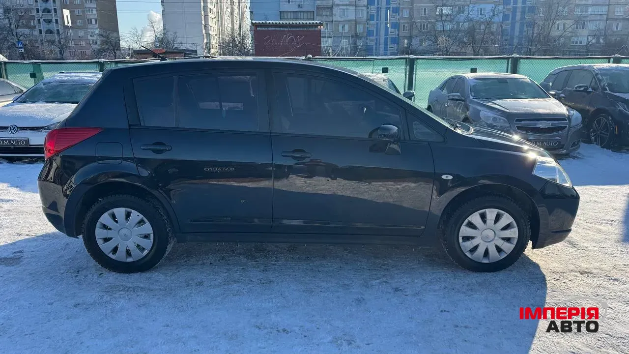 Nissan Tiida - фото 3