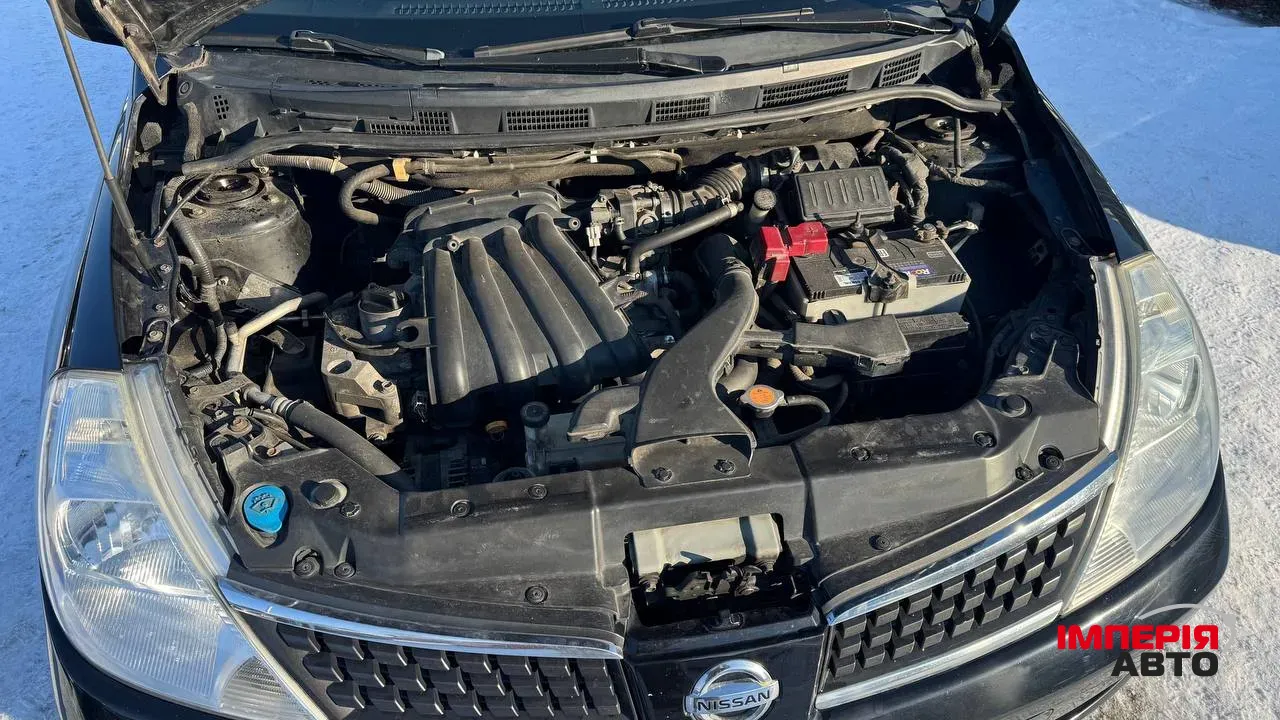 Nissan Tiida - фото 25