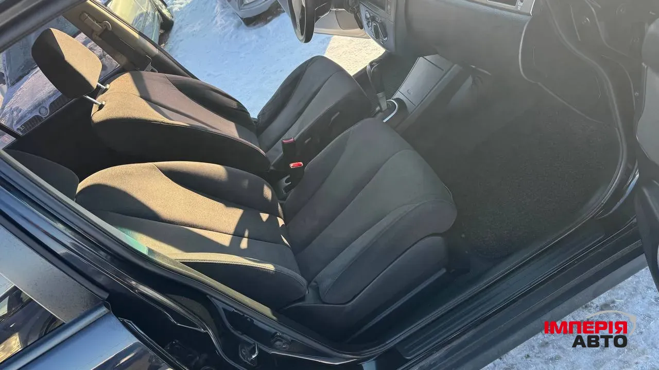 Nissan Tiida - фото 23