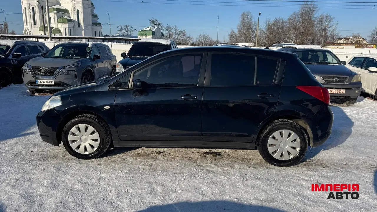 Nissan Tiida - фото 5
