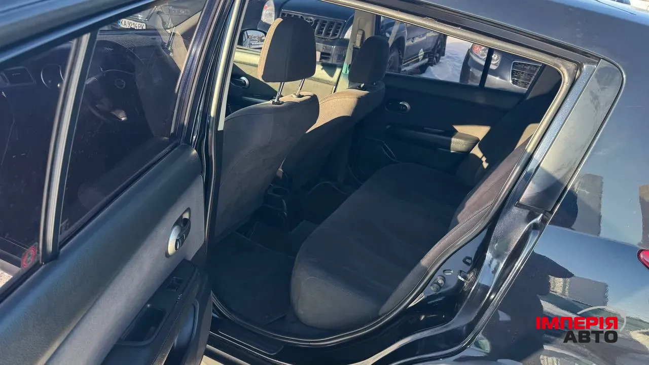 Nissan Tiida - фото 20