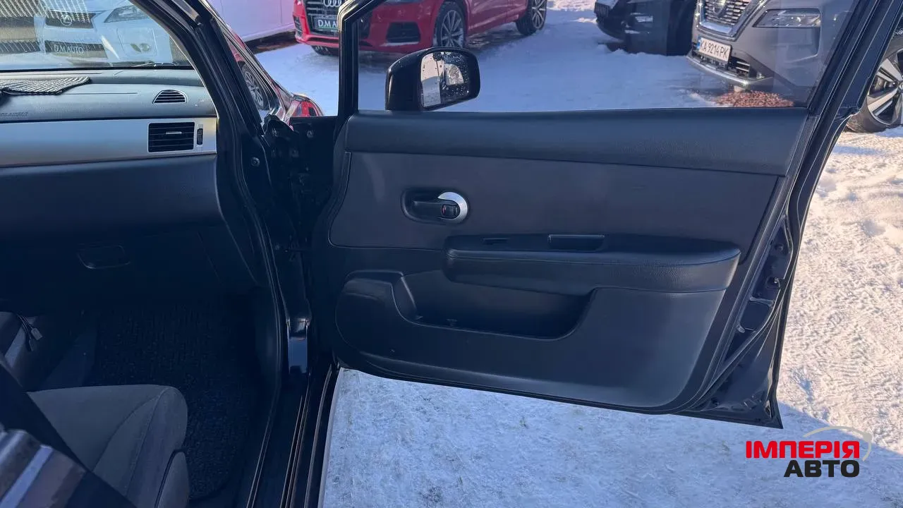 Nissan Tiida - фото 19