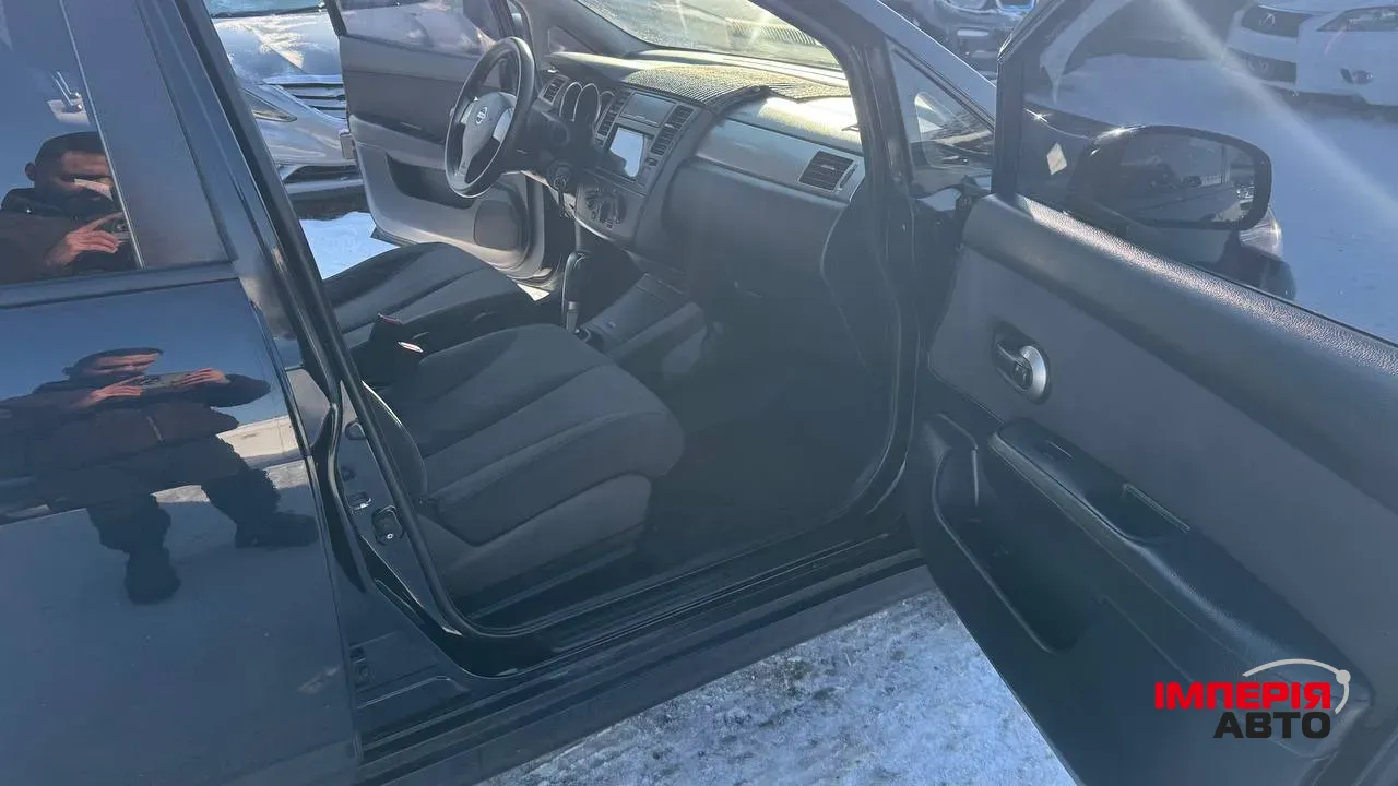 Nissan Tiida - фото 21