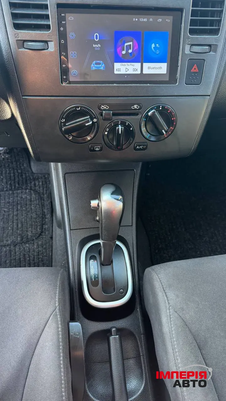 Nissan Tiida - фото 18