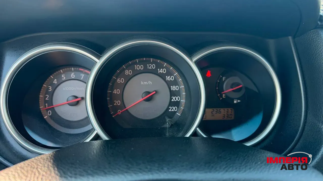 Nissan Tiida - фото 16