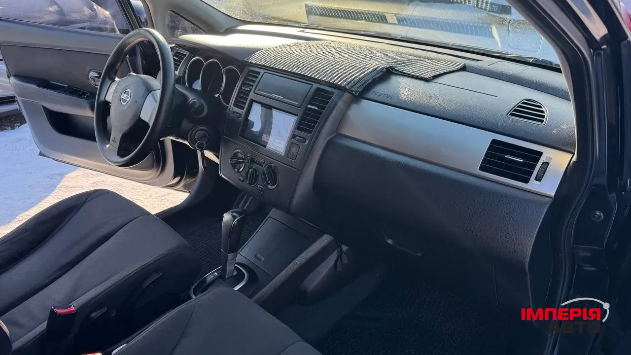 Nissan Tiida - фото 22