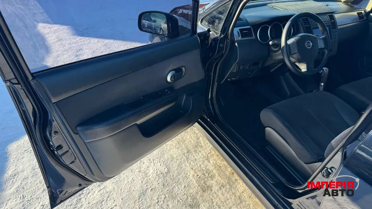 Nissan Tiida - фото 9