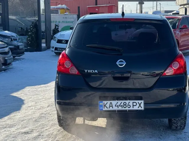 Nissan Tiida - фото 4