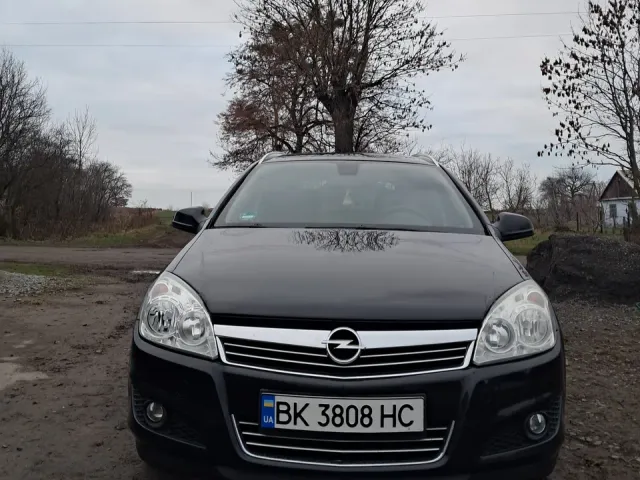 Opel Astra - фото 1