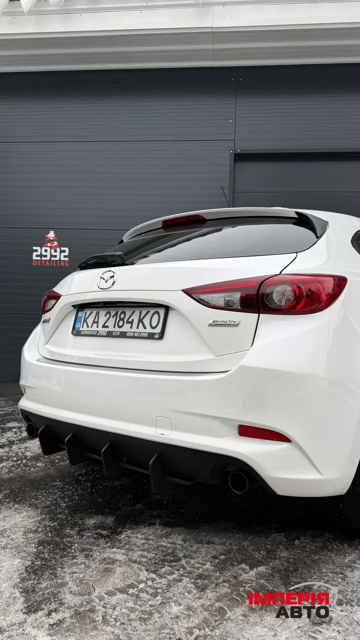 Mazda 3 - фото 14