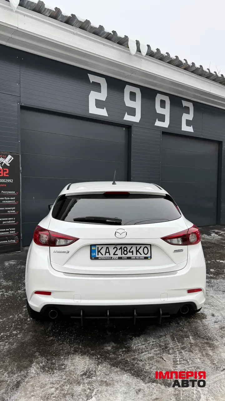 Mazda 3 - фото 15