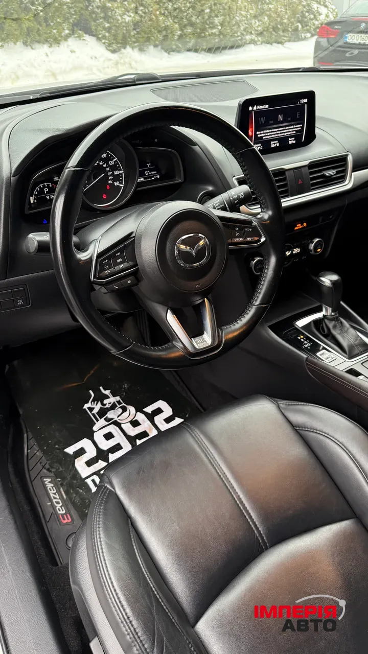 Mazda 3 - фото 17
