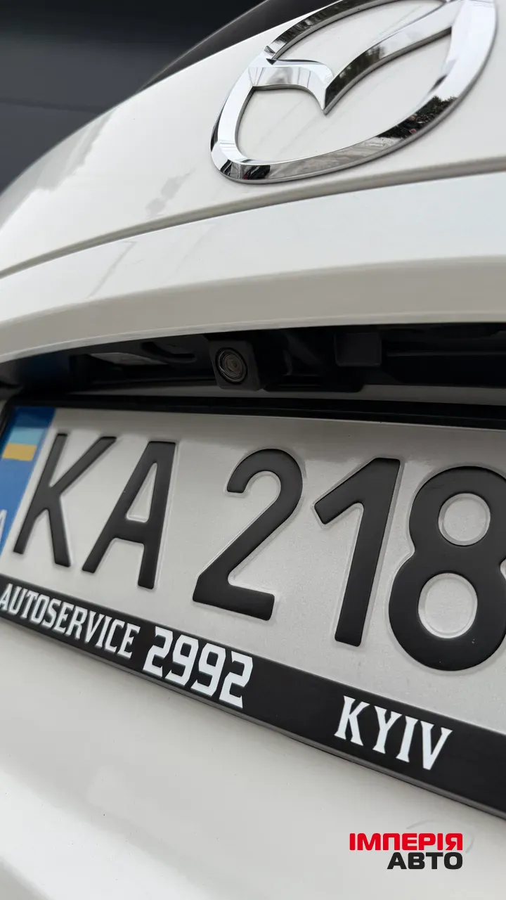 Mazda 3 - фото 11