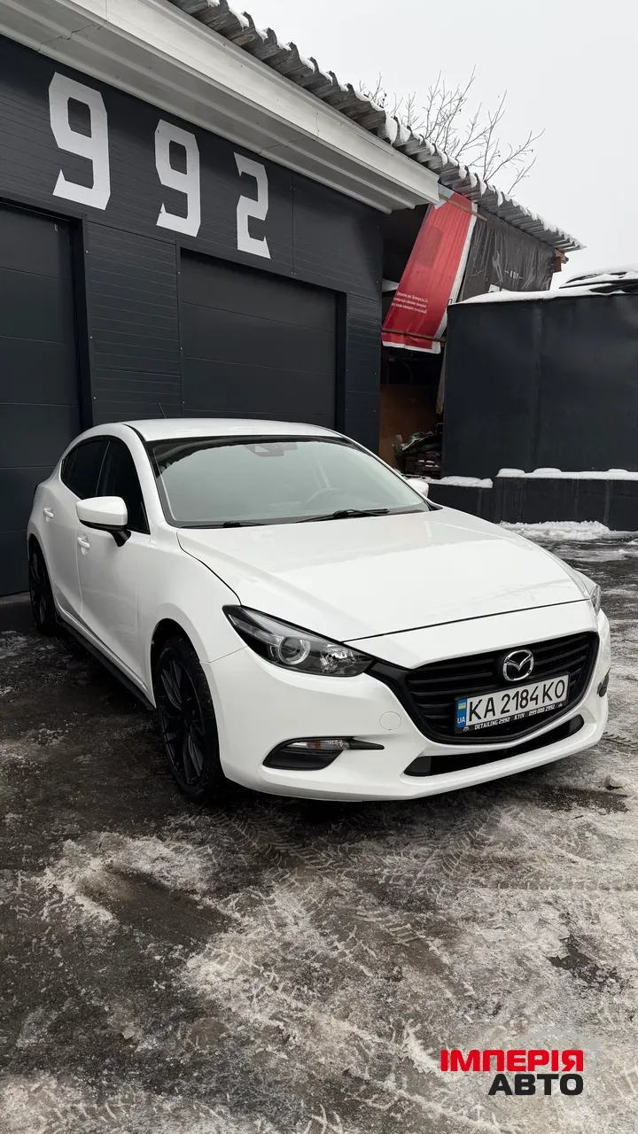 Mazda 3 - фото 2