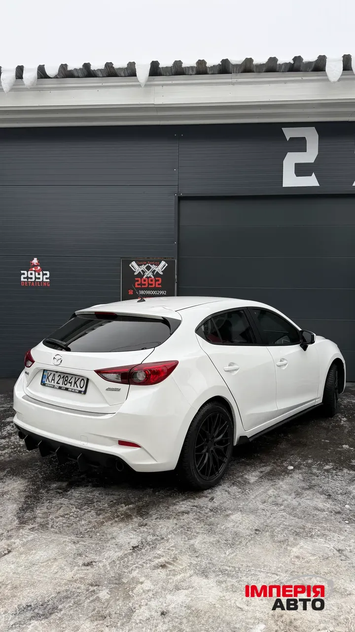 Mazda 3 - фото 4