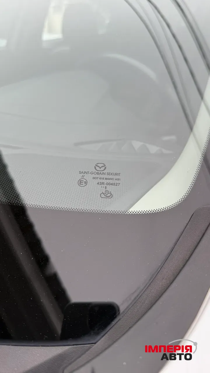 Mazda 3 - фото 16