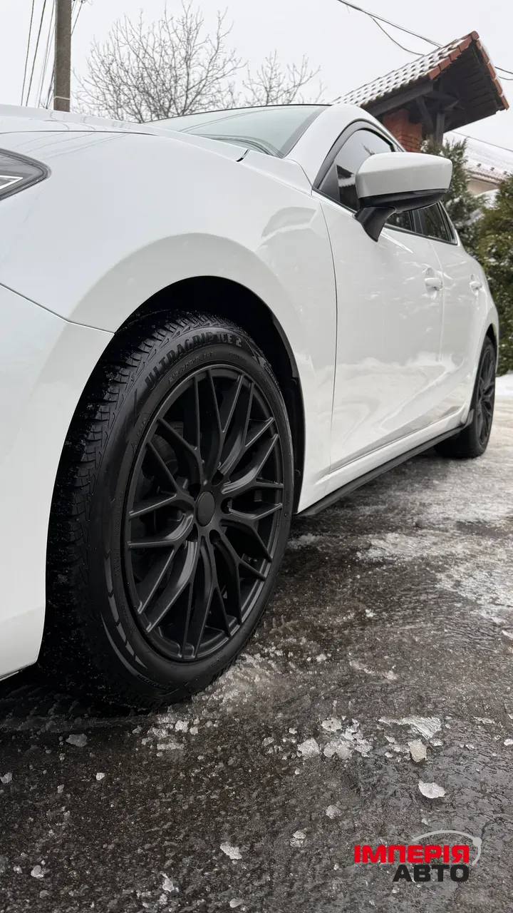 Mazda 3 - фото 8