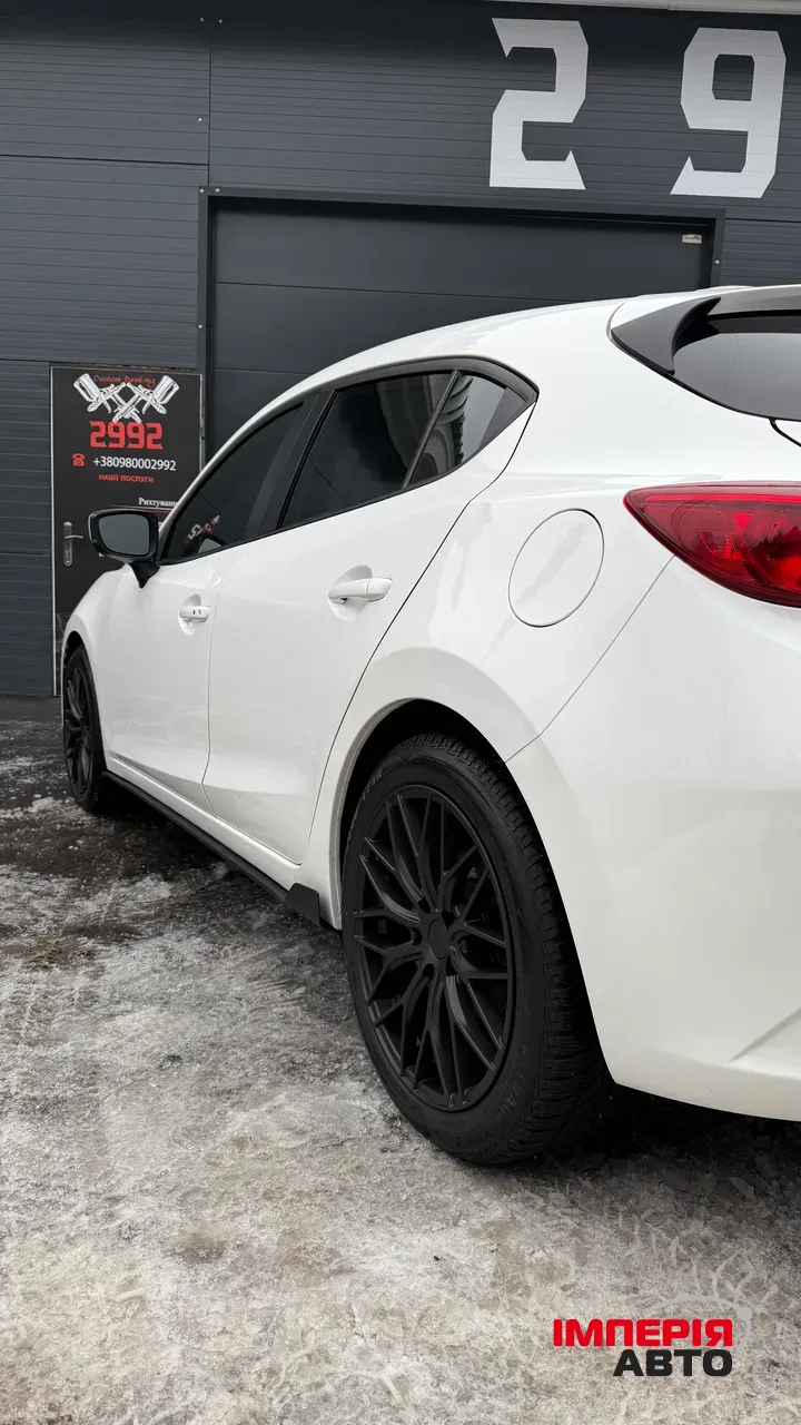 Mazda 3 - фото 7