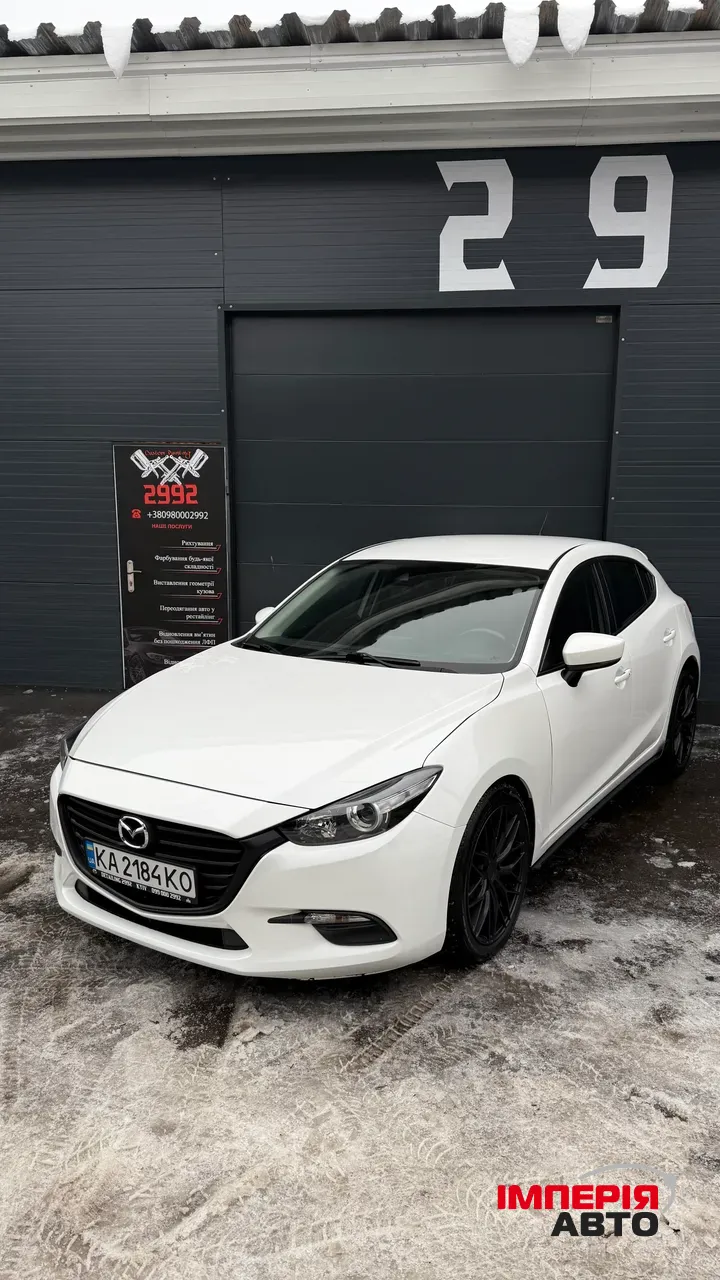 Mazda 3 - фото 1