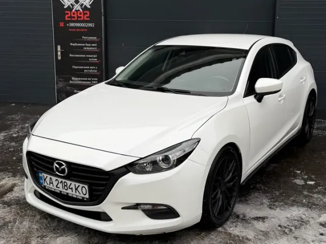 Mazda 3 - фото 1