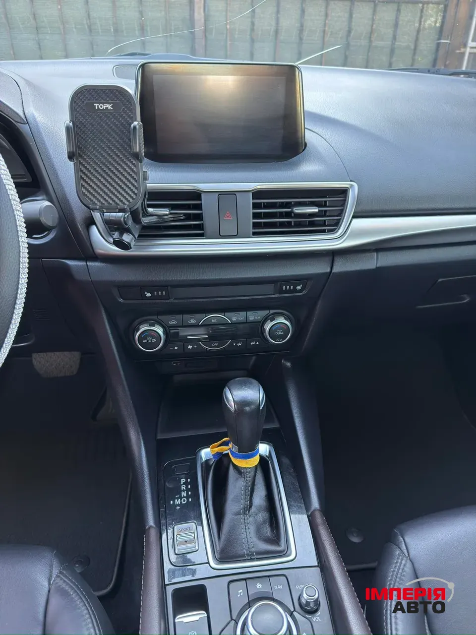 Mazda 3 - фото 10