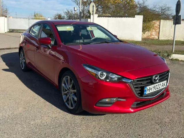 Mazda 3 - фото 4