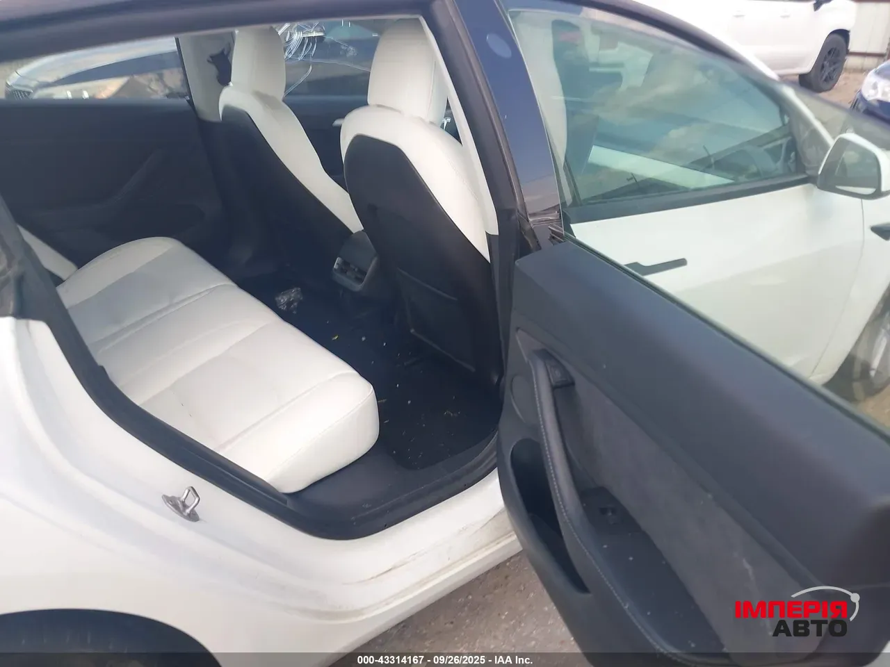 Tesla Model 3 - фото 7