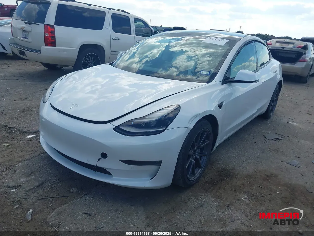 Tesla Model 3 - фото 2