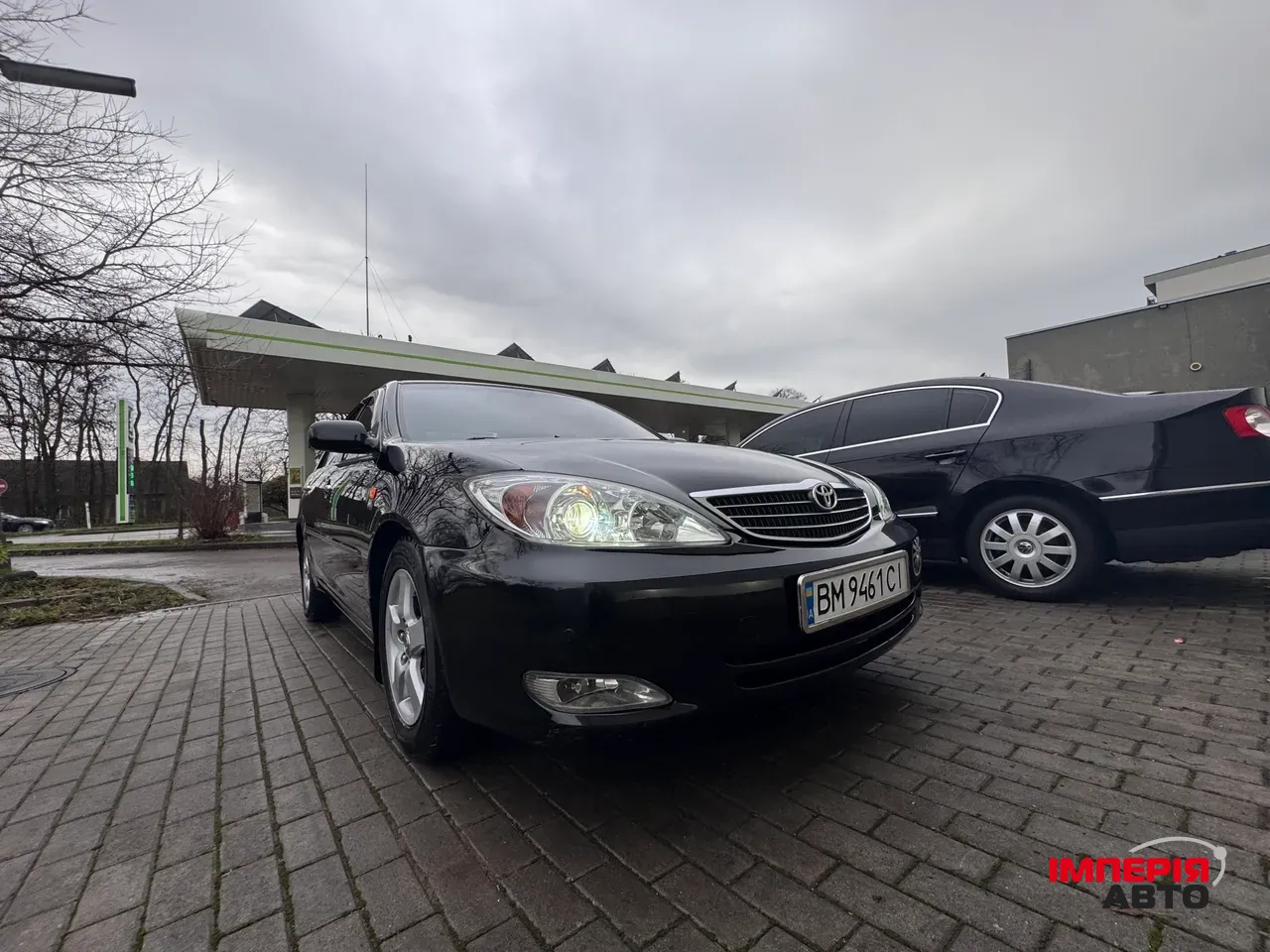 Toyota Camry - фото 1