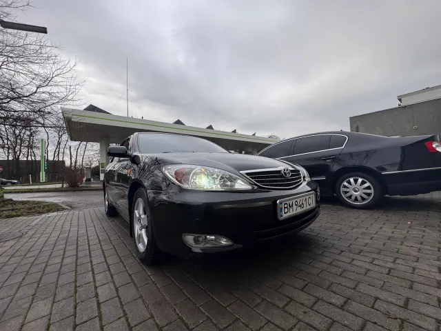 Toyota Camry - фото 1