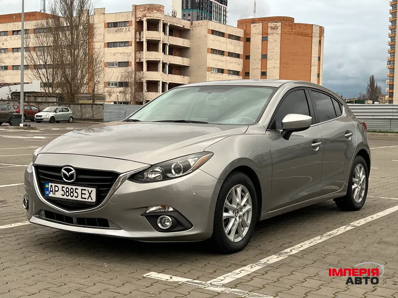 Mazda 3 - фото 4