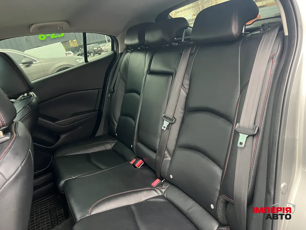 Mazda 3 - фото 10