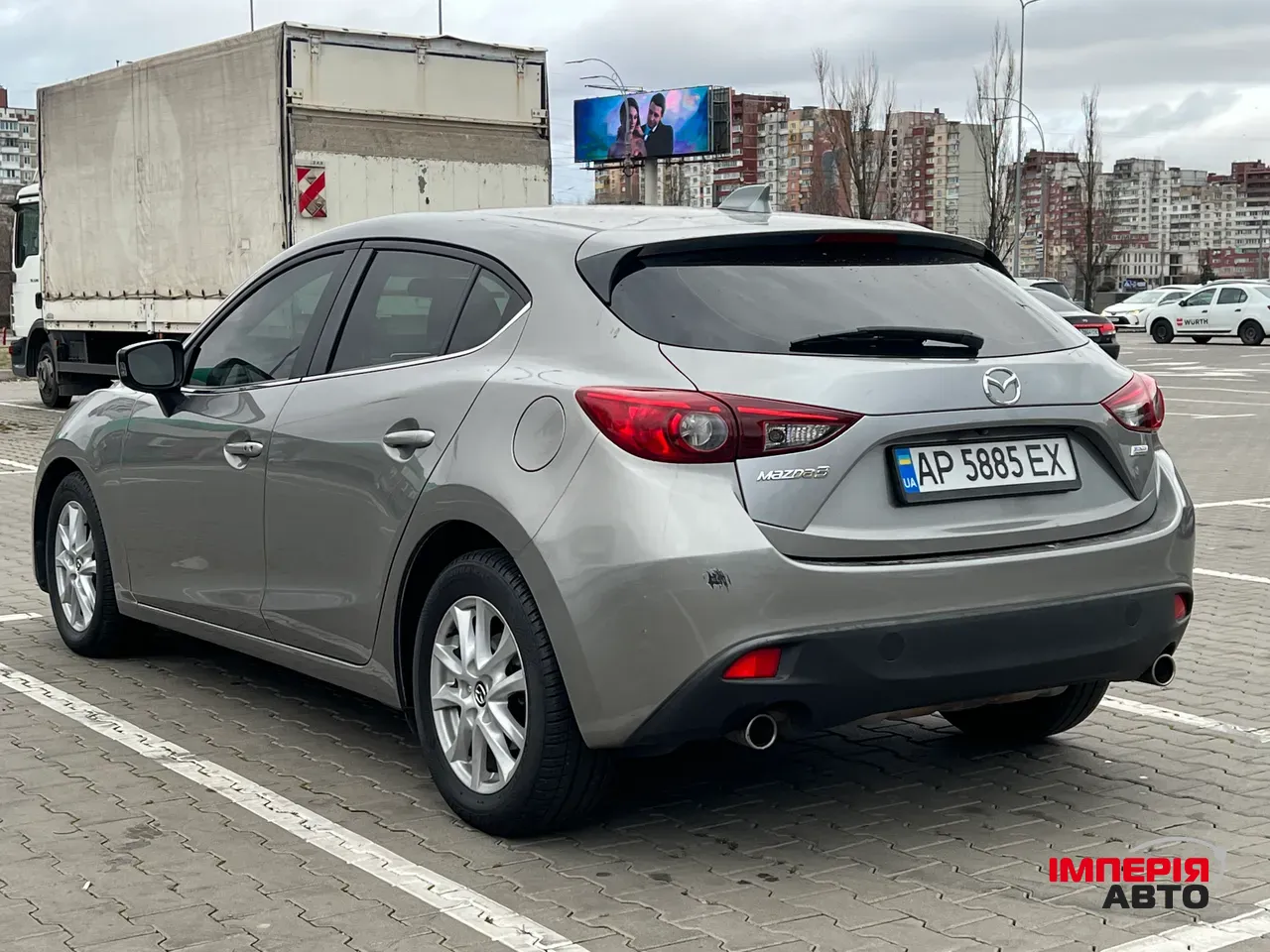 Mazda 3 - фото 8