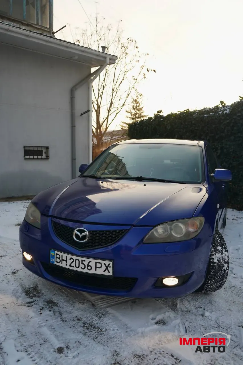 Mazda 3 - фото 1
