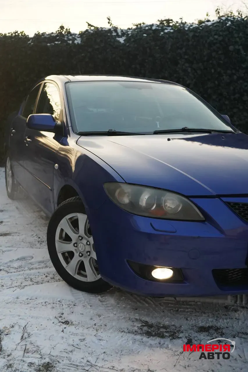 Mazda 3 - фото 5