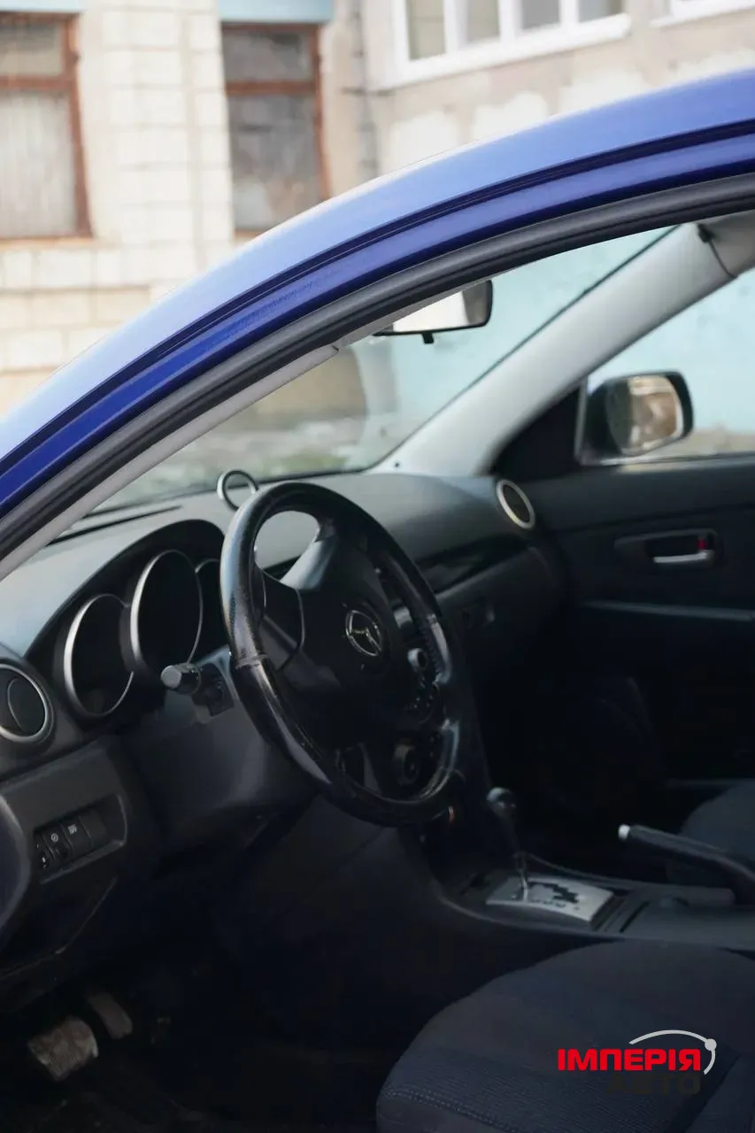 Mazda 3 - фото 9