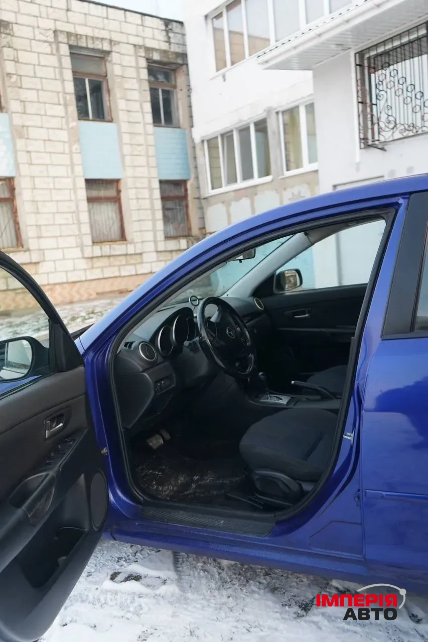 Mazda 3 - фото 8